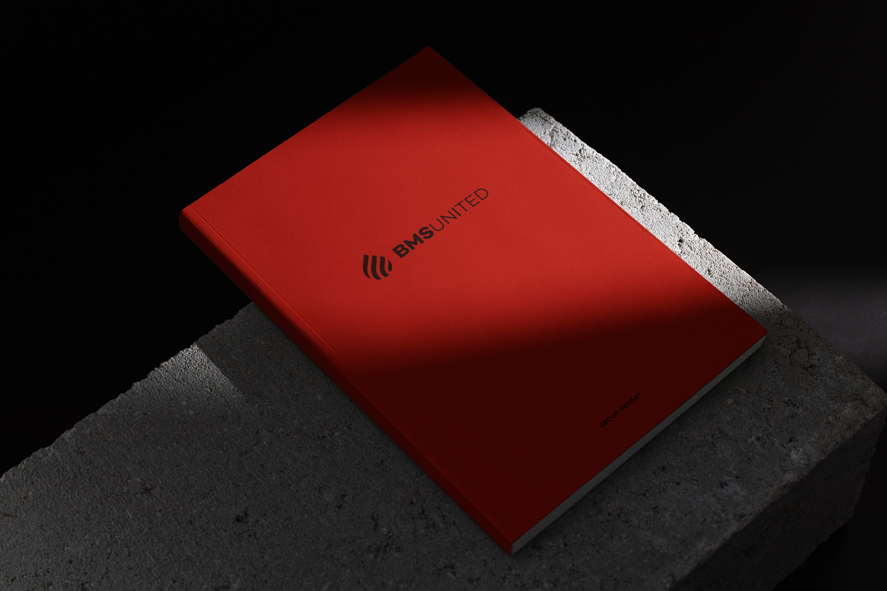 bms united branding brochure cover on concrete kommigraphics