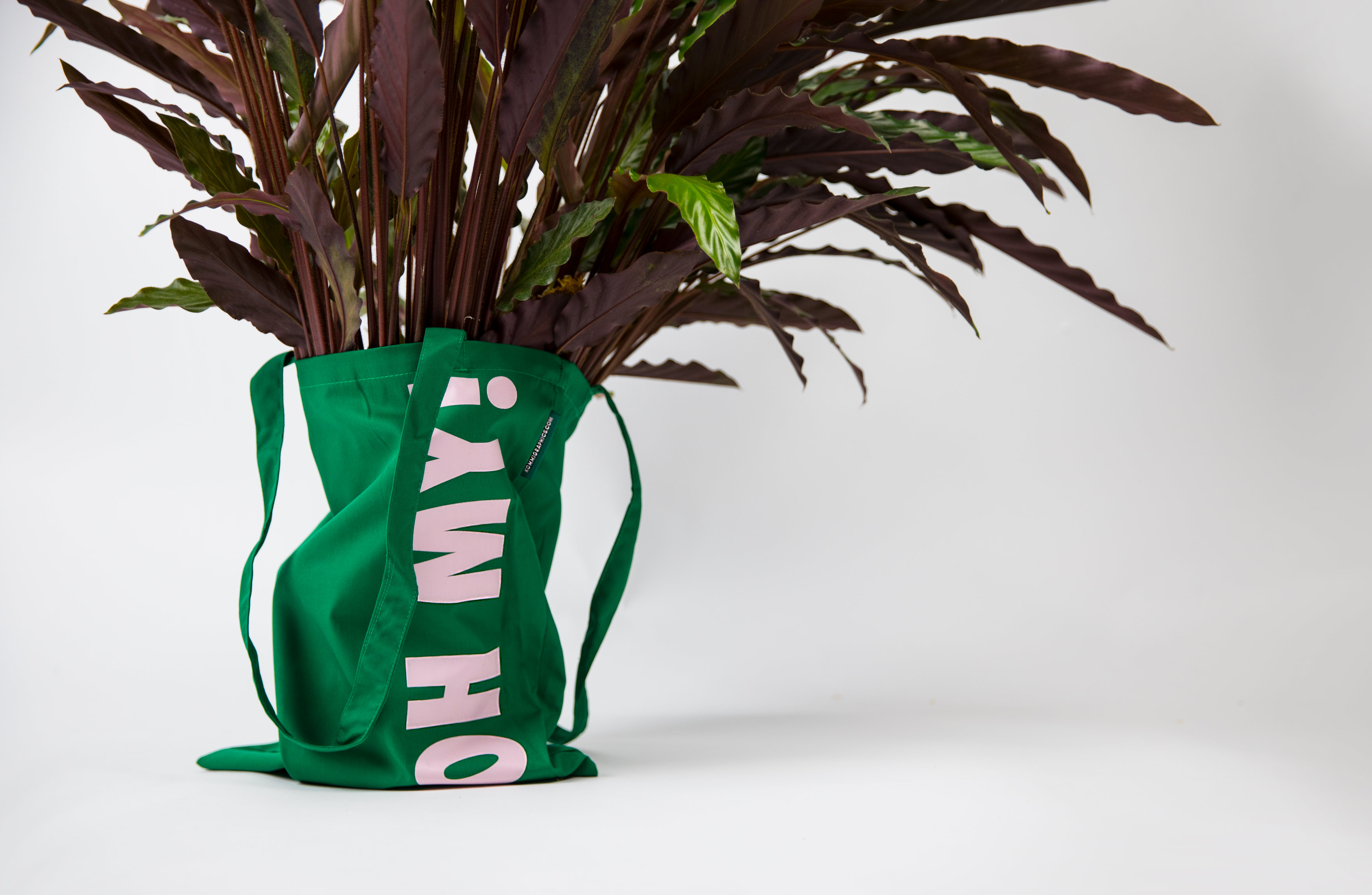 kommigraphics branding green tote bag kommigraphics