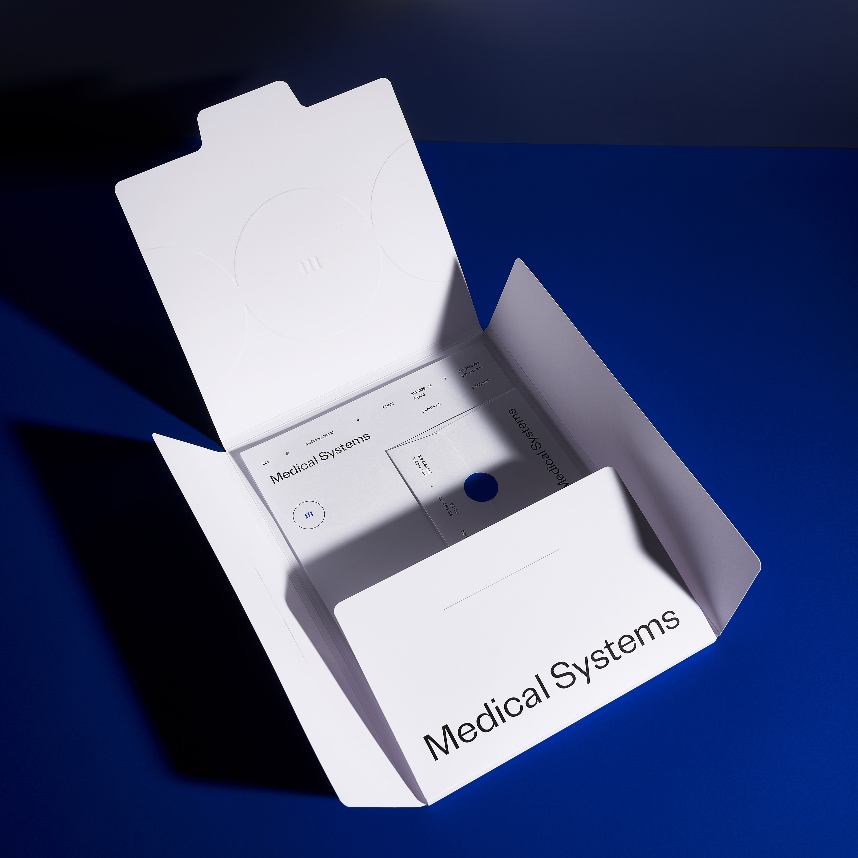 medical systems branding folder open top view kommigraphics