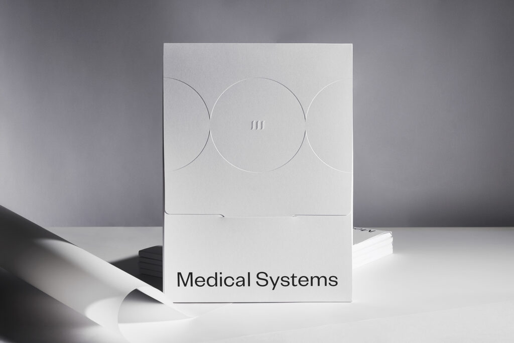 medical systems branding thumbs kommigraphics