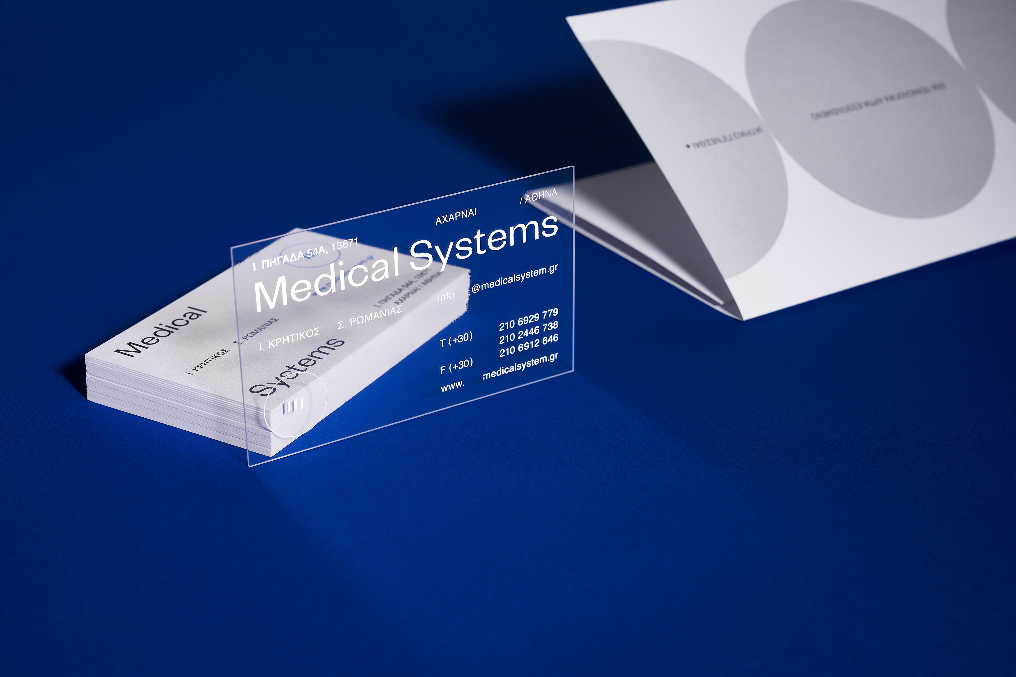 medical systems branding transparent business card kommigraphics