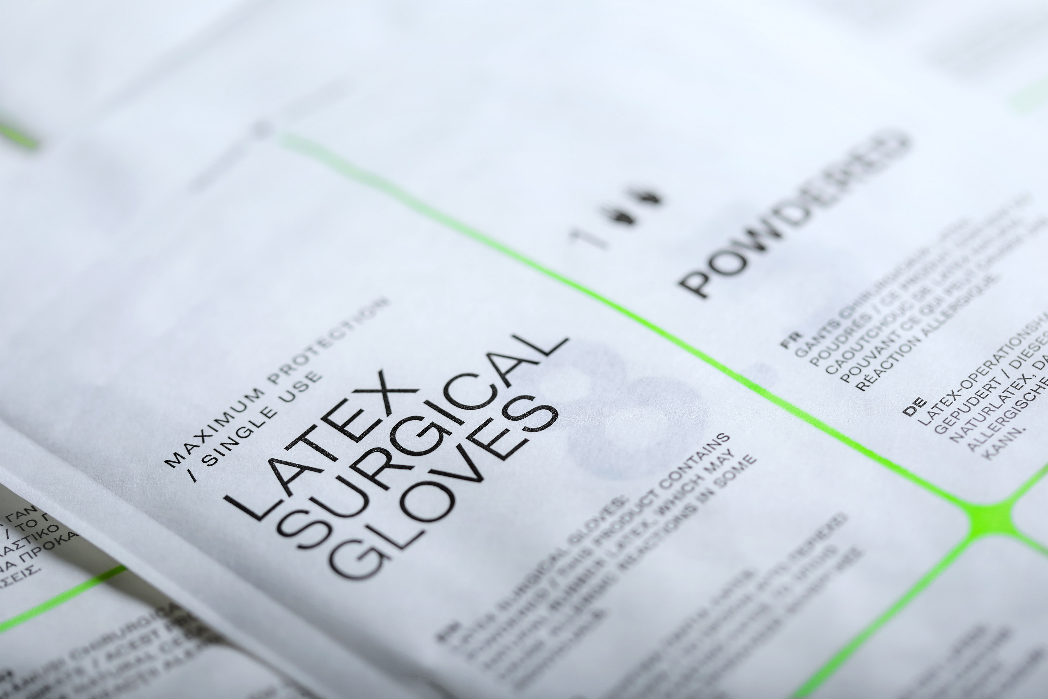 demotek surgical gloves packaging design sachets closeup typography kommigraphics